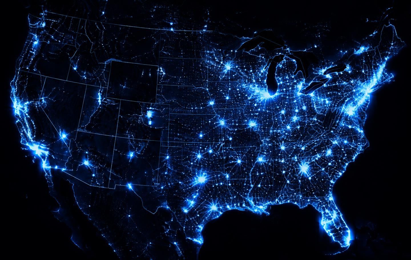 Night map of the United States with glowing city lights